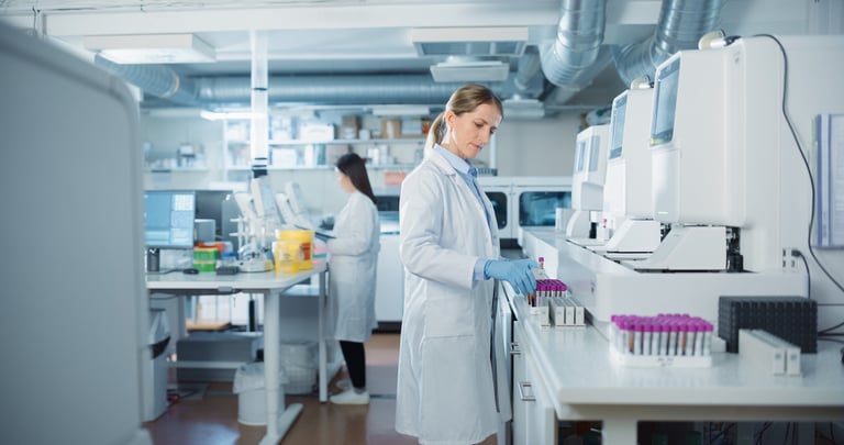 Biomedical researchers conducting experiments in a modern laboratory