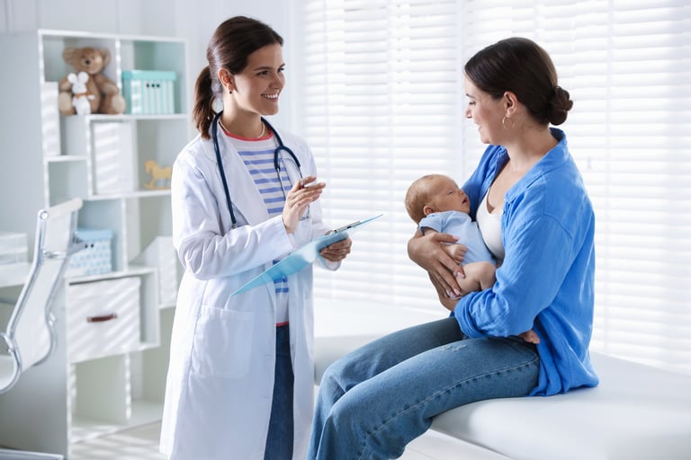 Mother and her cute little child having appointment with pediatrician in hospital. Checking baby's health