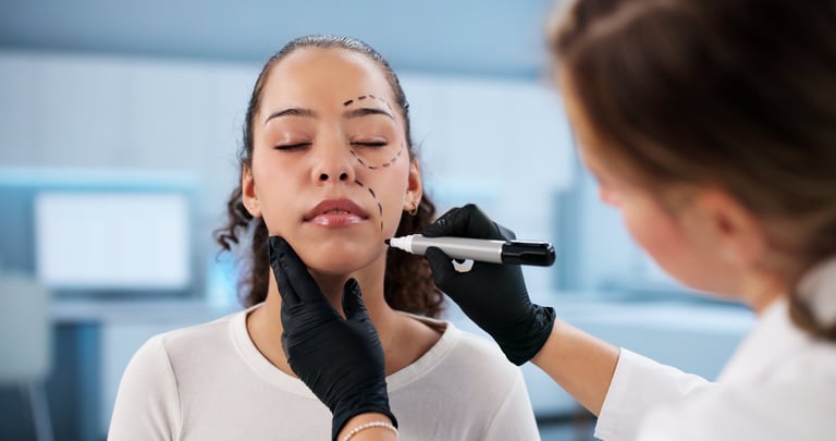 Expert Cosmetic Doctor Performing Aesthetic Surgery Treatment At Beauty Clinic