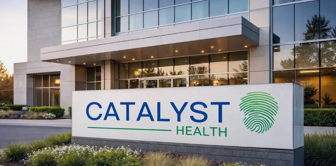 Modern office building with Catalyst Health signage and fingerprint logo at entrance